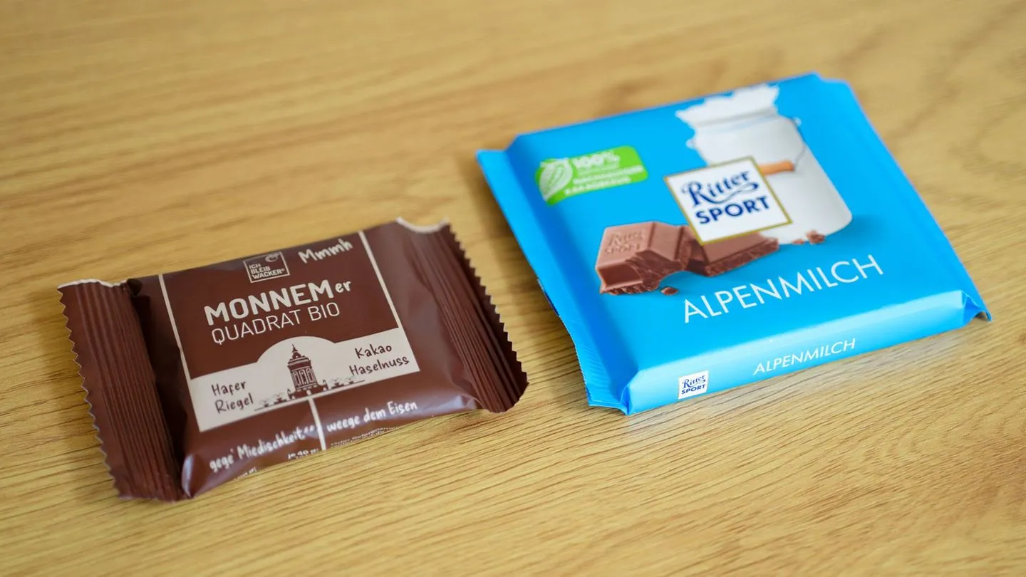 Schokolade gegen Haferriegel: Ritter Sport geht gegen Mannheimer Quadrat-Riegel vor